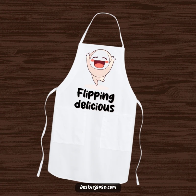 Funny apron showing a Daruma doll character doing a handstand while cooking, perfect for balanced chefs.