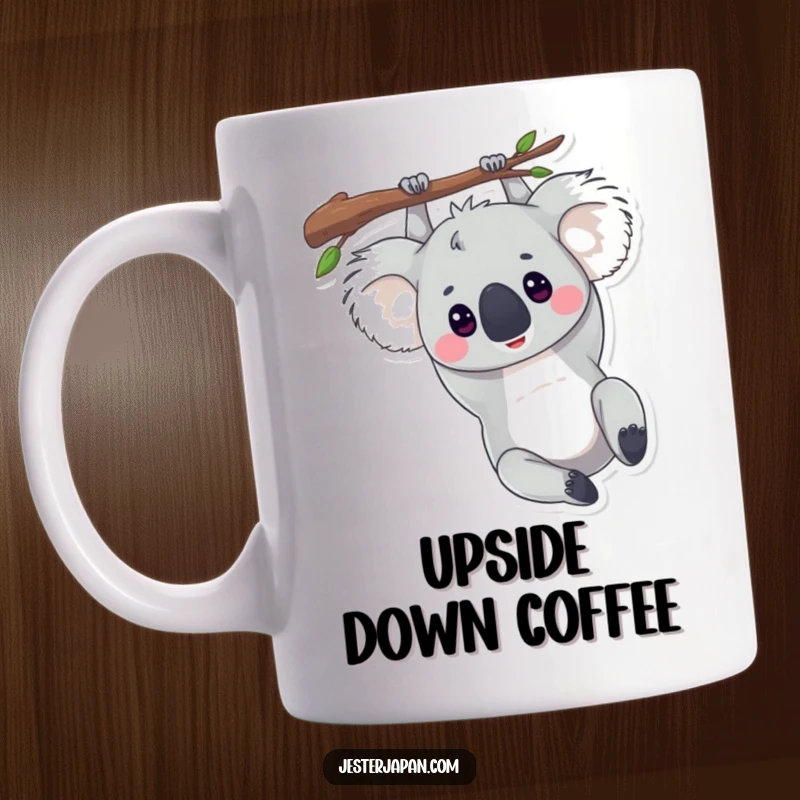 Funny mug featuring a relaxed koala hanging upside down from a tree branch, embodying ultimate chill.