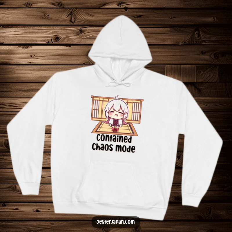 Funny hoodie with a character comically trying to fit onto a tiny Tatami mat, offering warmth and humorous relatability.