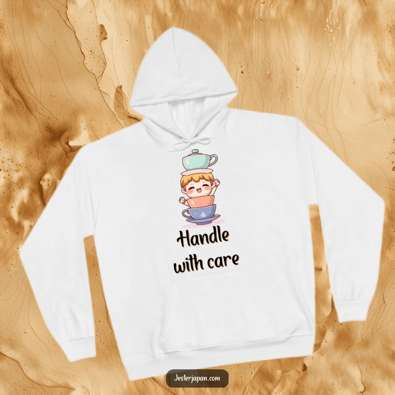 Funny hoodie depicting a character comically attempting to balance an unstable tower of tea cups, showcasing relatable, humorous struggle.