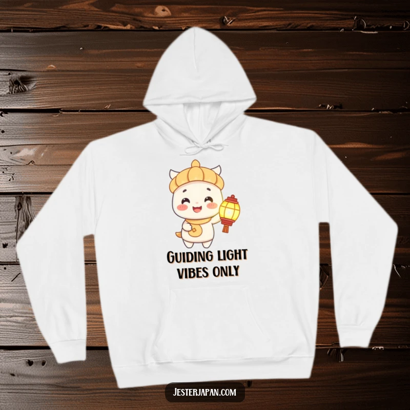 Funny Hoodie: A smiling character holds a lit lantern, spreading light and happiness, a perfect cozy and funny gift.