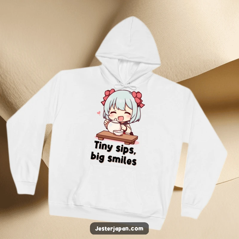 Funny hoodie design of a character happily performing a mock tea ceremony using a comically tiny teapot, evoking serene humor.