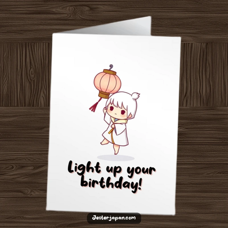 Funny Free Printable Birthday Card: Character playfully balances a small, glowing paper lantern with a mischievous grin. Joyful gift.