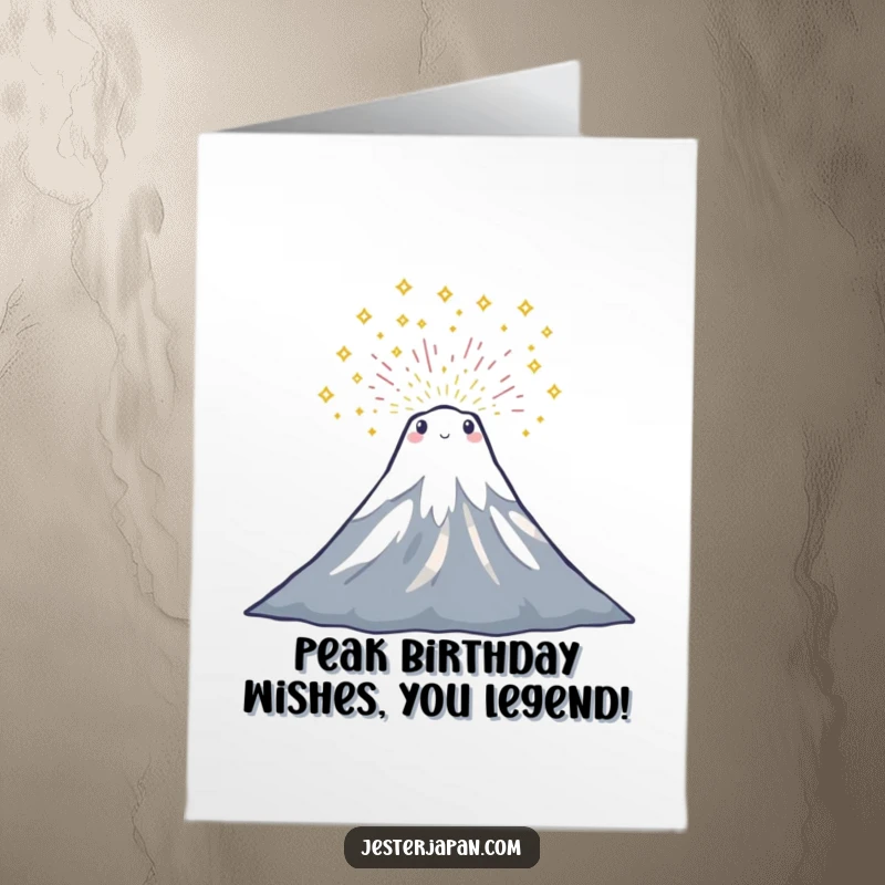 Funny Free Printable Birthday Card showing a tiny Mount Fuji character erupting joyfully with sparkling party confetti.