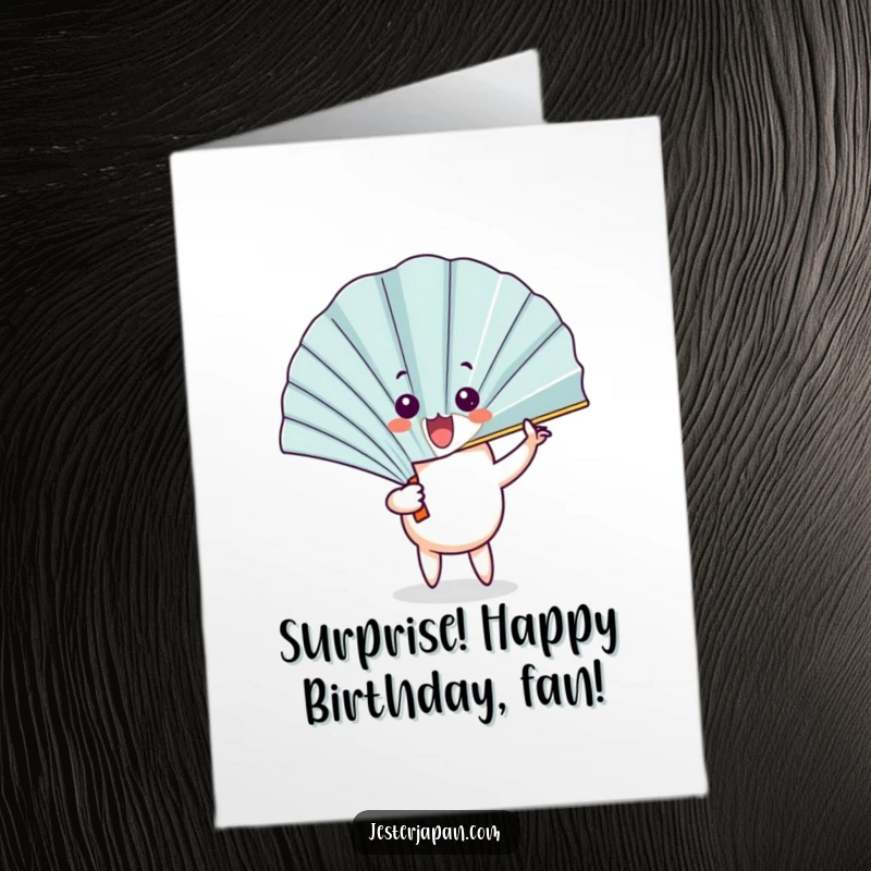 Funny Free Printable Birthday Card of a happy fan character unfurling with a flourish to reveal a comically surprised face.