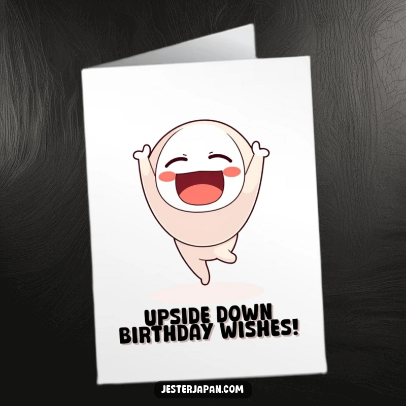 Funny Free Printable birthday card featuring a floating Daruma doll doing a joyful handstand, a symbol of achieving goals.