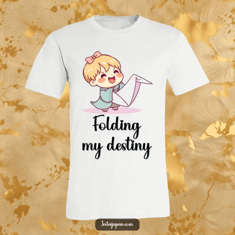 Funny Kawaii t-shirt depicting a cute character joyfully struggling to fold a comically oversized origami crane, showcasing persistence and humor.