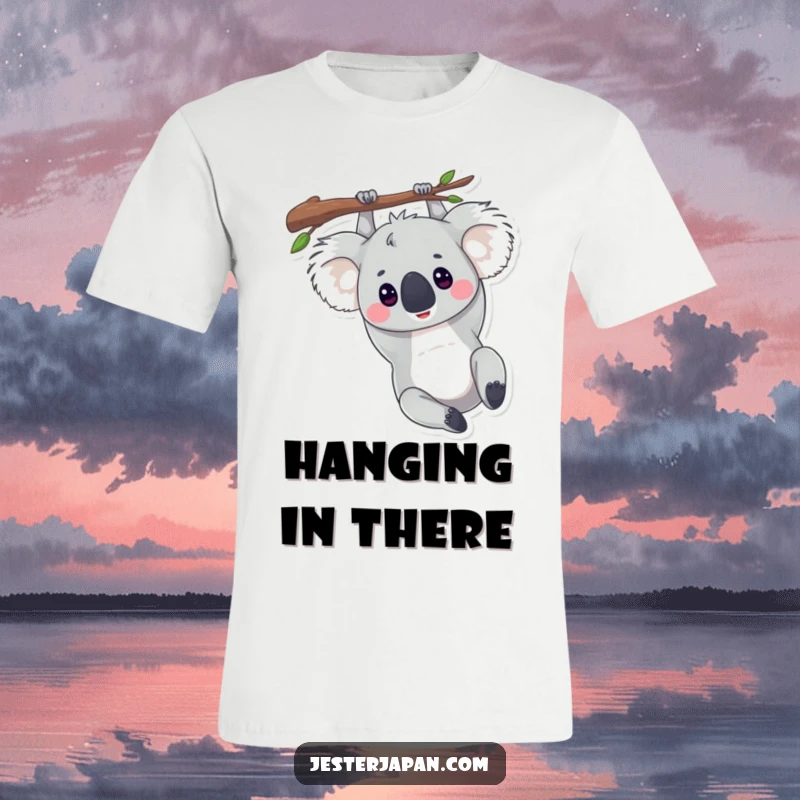 Funny t-shirt showcasing a content koala hanging upside down from a branch, radiating peaceful laziness.