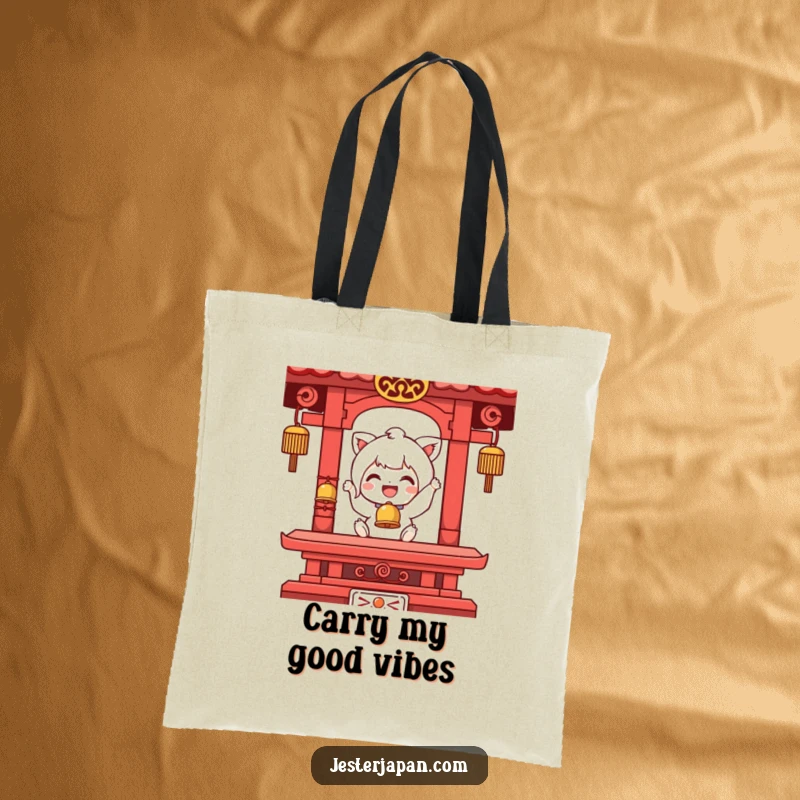 Funny tote bag depicting a character joyfully ringing a small temple bell, perfect for carrying daily items with a touch of cheer.